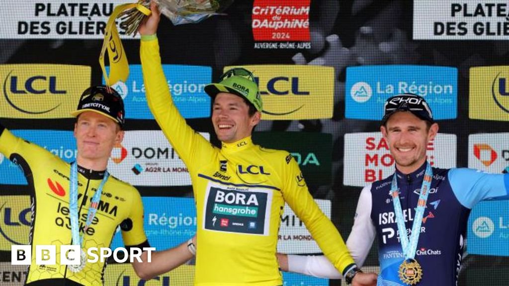 Matteo Jorgenson, Primoz Roglic and Derek Gee on the podium after finishing as the top three at the 2024 Criterium du Dauphine