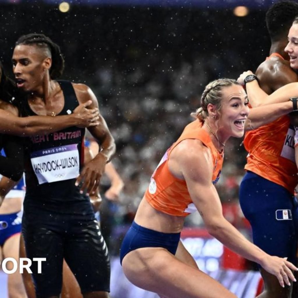 Great Britain and the Netherlands teams celebrate their respective mixed 4x400m relay medals